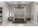 This bathroom is adorned with a large shower, makeup vanity and soaking tub at 505 Dragon Gate Ct, Henderson, NV 89012
