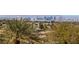 Take in the stunning Las Vegas city views from this location, surrounded by desert flora and upscale homes at 505 Dragon Gate Ct, Henderson, NV 89012