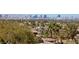Enjoy stunning city views from this location, nestled among mature landscaping and upscale neighborhood charm at 505 Dragon Gate Ct, Henderson, NV 89012