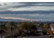 Enjoy beautiful views of the Las Vegas Strip skyline, mountains, and neighborhood trees at 505 Dragon Gate Ct, Henderson, NV 89012
