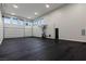 This oversized garage area offers plenty of open space with an installed basketball hoop setup at 505 Dragon Gate Ct, Henderson, NV 89012