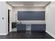 The garage features a sink, utility area, and ample cabinet storage for all your tools and accessories at 505 Dragon Gate Ct, Henderson, NV 89012