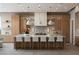 Gourmet kitchen with large center island and breakfast bar perfect for modern living and entertaining at 505 Dragon Gate Ct, Henderson, NV 89012