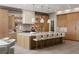 Stunning kitchen featuring a large island, pendant lighting, and custom wood cabinetry at 505 Dragon Gate Ct, Henderson, NV 89012