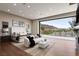 This bright main bedroom offers a private balcony with stunning views at 505 Dragon Gate Ct, Henderson, NV 89012