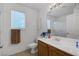 Bathroom vanity with a large mirror and good lighting at 5081 Pine Mountain Ave, Las Vegas, NV 89139