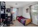 Bedroom with a desk and artwork at 5081 Pine Mountain Ave, Las Vegas, NV 89139