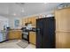 Efficient kitchen featuring stainless steel appliances, and light oak cabinets at 5081 Pine Mountain Ave, Las Vegas, NV 89139