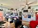 Open-concept living and kitchen area with lots of decor at 5225 W Reno Ave # 219, Las Vegas, NV 89118