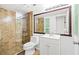 Bathroom featuring a tiled shower, vanity with cabinet, and a large mirror at 5628 Crimson Ridge Dr, Las Vegas, NV 89130