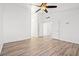 Bedroom featuring a ceiling fan, wood-look flooring and an open doorway at 5628 Crimson Ridge Dr, Las Vegas, NV 89130