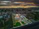Wide aerial view of property featuring pool and outdoor living spaces at 5700 N Torrey Pines Dr, Las Vegas, NV 89130