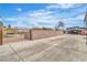 Spacious backyard featuring a covered patio, pool, and ample parking space at 5700 N Torrey Pines Dr, Las Vegas, NV 89130