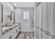 Bathroom featuring modern fixtures, granite countertop, and stylish decor at 5700 N Torrey Pines Dr, Las Vegas, NV 89130