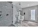 Modern bathroom with walk-in shower with glass enclosure and sleek fixtures at 5700 N Torrey Pines Dr, Las Vegas, NV 89130