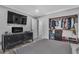 Bedroom featuring a closet and modern furnishings and wood-look flooring at 5700 N Torrey Pines Dr, Las Vegas, NV 89130