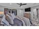 Bedroom featuring a king bed, TV and closet at 5700 N Torrey Pines Dr, Las Vegas, NV 89130