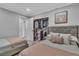 Bedroom featuring two beds and walk-in closet at 5700 N Torrey Pines Dr, Las Vegas, NV 89130