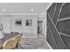 Hallway view of dining table and chairs, with decorative wall finishings at 5700 N Torrey Pines Dr, Las Vegas, NV 89130