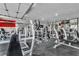 Large, well-equipped home gym featuring various weight machines and ample open workout space at 5700 N Torrey Pines Dr, Las Vegas, NV 89130