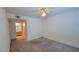 Clean and spacious bedroom with neutral walls and carpeting, ready for personalization at 5710 E Tropicana Ave # 2049, Las Vegas, NV 89122
