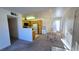 Open-concept living space with combined kitchen and dining areas, great for entertaining guests at 5710 E Tropicana Ave # 2049, Las Vegas, NV 89122