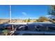 Covered parking spaces offer assigned spots within a community with mountain views at 5710 E Tropicana Ave # 2049, Las Vegas, NV 89122