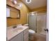 Small bathroom featuring a single sink vanity, matching toilet and shower at 6620 Casa Linda Dr, Las Vegas, NV 89103
