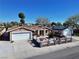 Charming single-story home with desert landscaping, fenced yard, and attached two-car garage at 6620 Casa Linda Dr, Las Vegas, NV 89103