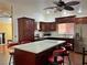 Open kitchen featuring a central island with seating and modern stainless steel appliances, ideal for entertaining and Gathering meals at 6620 Casa Linda Dr, Las Vegas, NV 89103