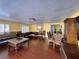 Large living room featuring shutters, wood-look floors and elegant furniture at 6620 Casa Linda Dr, Las Vegas, NV 89103