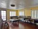 Spacious living room featuring shutters, wood-look floors and elegant furniture at 6620 Casa Linda Dr, Las Vegas, NV 89103