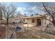 Spacious backyard with patio, landscaping and a swingset, perfect for outdoor activities and relaxation at 715 Rusty Spur Dr, Henderson, NV 89014