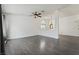 Spacious living room featuring sleek flooring, a ceiling fan, and plenty of natural light at 715 Rusty Spur Dr, Henderson, NV 89014