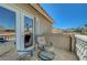 Balcony seating area with neighborhood views at 7420 Enchanted Hills Ct, Las Vegas, NV 89129
