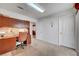 Office space with cabinets, desk, and two doors at 7420 Enchanted Hills Ct, Las Vegas, NV 89129