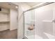 Bathroom featuring a glass enclosed shower with a built in seat at 7449 Bosco Dr # Lot 106, North Las Vegas, NV 89084