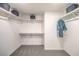 Walk-in closet with ample shelving and hanging space at 7449 Bosco Dr # Lot 106, North Las Vegas, NV 89084