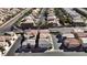 Expansive neighborhood aerial view showcasing many homes, paved roads and desert landscaping at 7486 River Dove Ct, Las Vegas, NV 89139