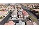 Expansive neighborhood aerial view showcasing many homes, paved roads and desert landscaping at 7486 River Dove Ct, Las Vegas, NV 89139