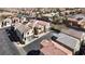 Expansive neighborhood aerial view showcasing many homes, paved roads and desert landscaping at 7486 River Dove Ct, Las Vegas, NV 89139
