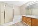 Bright bathroom featuring a shower over tub and double sink vanity with modern finishes at 7486 River Dove Ct, Las Vegas, NV 89139