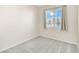 Bright and airy bedroom with large window, neutral carpet, and light-colored walls at 7486 River Dove Ct, Las Vegas, NV 89139