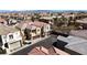 Inviting two-story home with desert landscaping, a private balcony and attached two car garage at 7486 River Dove Ct, Las Vegas, NV 89139
