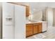 The kitchen shows off wood cabinets, stainless steel appliances, and a modern sink setup at 7486 River Dove Ct, Las Vegas, NV 89139