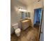 Well-lit bathroom with a vanity and a toilet, showcasing the modern design and functionality at 8250 N Grand Canyon Dr # 2085, Las Vegas, NV 89166