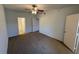 A bright bedroom with two doors, including one leading to an ensuite bathroom at 8250 N Grand Canyon Dr # 2085, Las Vegas, NV 89166