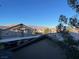 Complex view showcasing roof tops and beautiful mountain views from the units at 8250 N Grand Canyon Dr # 2085, Las Vegas, NV 89166
