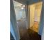 Hallway that leads to a bedroom and bathroom; doors open to each, showcasing the home's layout at 8250 N Grand Canyon Dr # 2085, Las Vegas, NV 89166