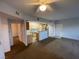 Open living space flowing into kitchen, bathed in natural light, perfect for entertaining at 8250 N Grand Canyon Dr # 2085, Las Vegas, NV 89166